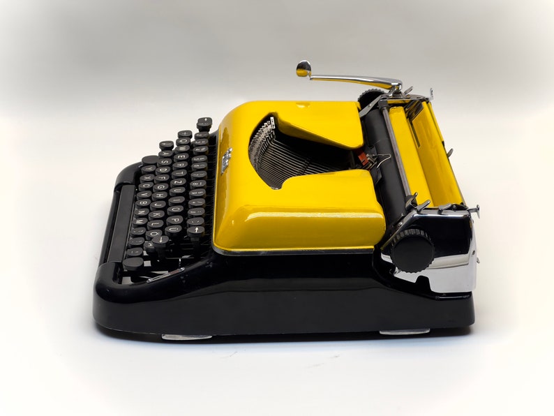 Erika Black Typewriter, 1955 Model with Yellow Cover and Details - Perfect Gift, Case Not Included