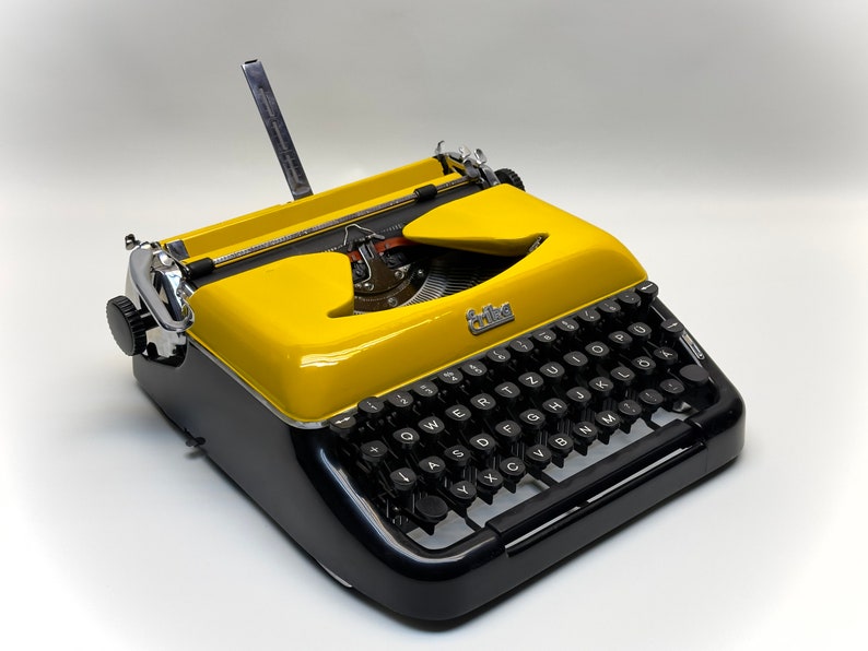 Erika Black Typewriter, 1955 Model with Yellow Cover and Details - Perfect Gift, Case Not Included