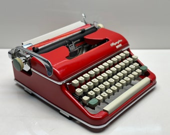 Olympia Monica Schreibmaschine – Vintage-Ausgabe von 1955 in auffälligem Rot – Modell von 1960, rotes Gehäuse, weiße Tasten, zweifarbig, makelloses Gehäuse
