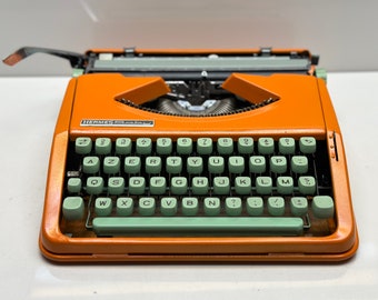 Swedish Craftsmanship: Orange Hermes Typewriter - Azerty Keyboard