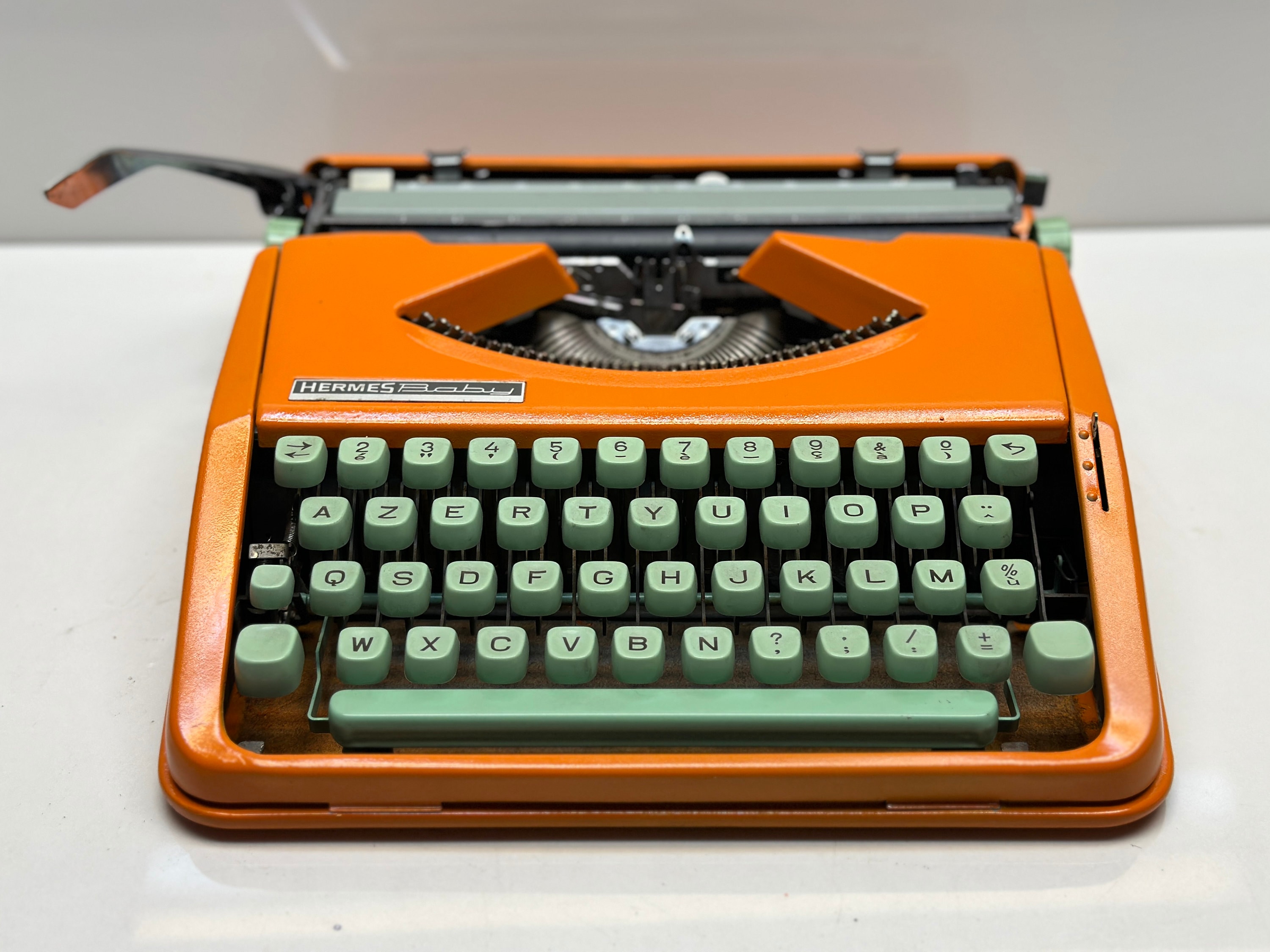 Swedish Craftsmanship: Orange Hermes Typewriter - Azerty Keyboard