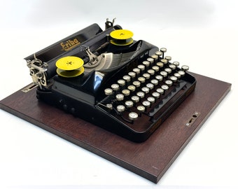 Rara máquina de escribir antigua Erika: edición negra vintage de 1945, con servicio completo