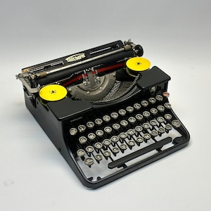 Adler Triumph Typewriter - Vintage 1940 Model with QWERTZ Layout and Glass Black Keys