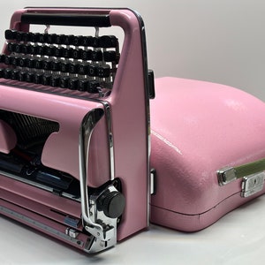 Elegant Pink Olympia SM3 Typewriter with Matching Pink Bag - A Fusion of Style and Functionality