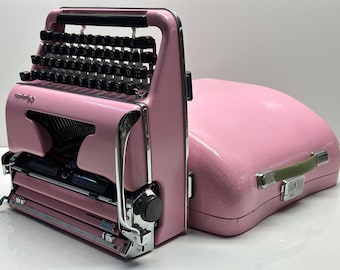 Elegant Pink Olympia SM3 Typewriter with Matching Pink Bag - A Fusion of Style and Functionality