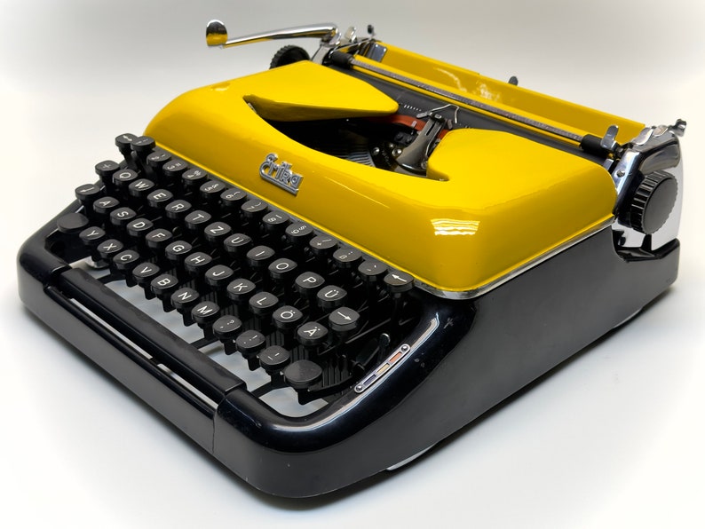 Erika Black Typewriter, 1955 Model with Yellow Cover and Details - Perfect Gift, Case Not Included