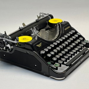 Vintage Black Continental Typewriter: 1945 QWERTZ Glass Key Keyboard