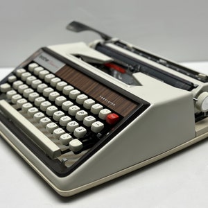 Brother Deluxe Typewriter - Vintage 1955 Edition in Classic Whiter - Warranty Included, Complete Documentation, Portable Case,