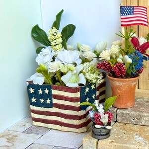 Miniature floral arrangement in ceramic pot for dollhouse, collector or plant lover in 1:12 scale.
