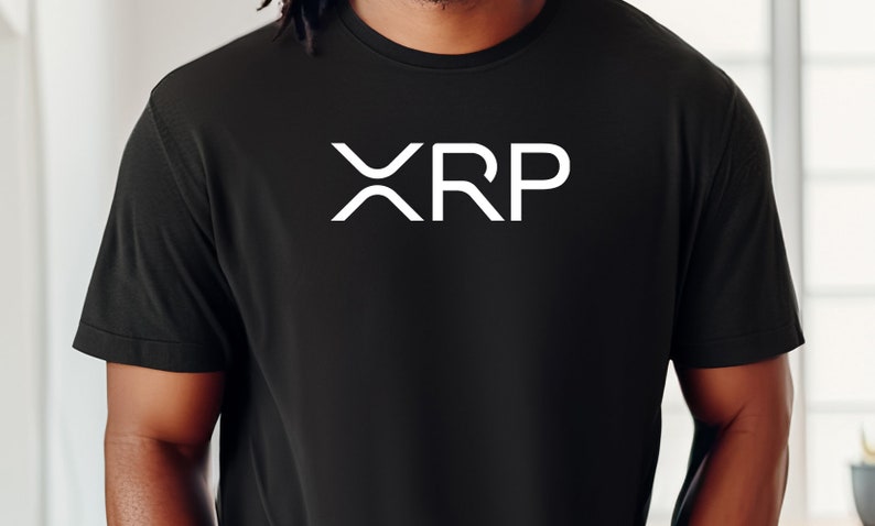 May include: Black t-shirt with a white "XRP" logo printed on the front.