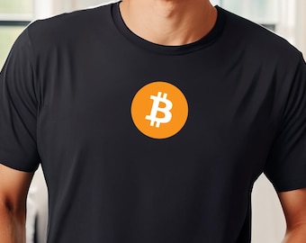 May include: Black t-shirt with a Bitcoin logo. The Bitcoin logo is a white "B" inside an orange circle. The shirt is made of a soft material and has short sleeves. The shirt is a solid black color.