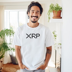 May include: A white t-shirt with a black "XRP" logo printed on the front.