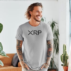 May include: A gray t-shirt with a black "XRP" logo printed on the front.