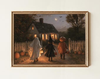 May include: A framed wall art print depicting three figures in Halloween costumes walking toward a lit house at night. One figure wears a white ghost sheet, one a black witch outfit, and one a pumpkin head. Pumpkins sit along a white picket fence.