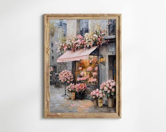 Può includere: Dipinto incorniciato di un negozio di fiori parigino, con una tenda da sole rosa e abbondanti composizioni floreali. L'opera d'arte utilizza una tavolozza di colori tenui, con fiori rosa e bianchi, creando una scena romantica. Il dipinto è in una cornice di legno.