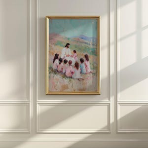 May include: A framed painting depicts a religious scene with a figure in white robes surrounded by children. The artwork features soft colors, with a gold frame. The background shows a landscape with hills and a light blue sky.