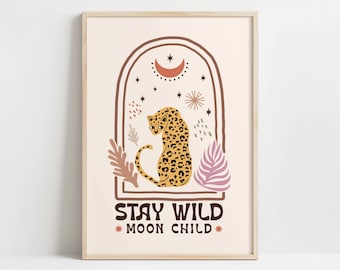 May include: A beige print with a leopard in an archway with stars and a crescent moon. The text reads "Stay Wild Moon Child".