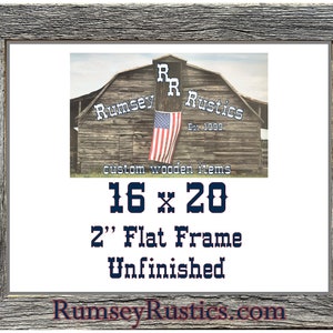 May include: Unfinished 2-inch thick flat frame made of reclaimed wood. The frame is 16 inches by 20 inches and is shown against a white background. The frame is made by Rumsey Rustics, a company that specializes in custom wooden items.