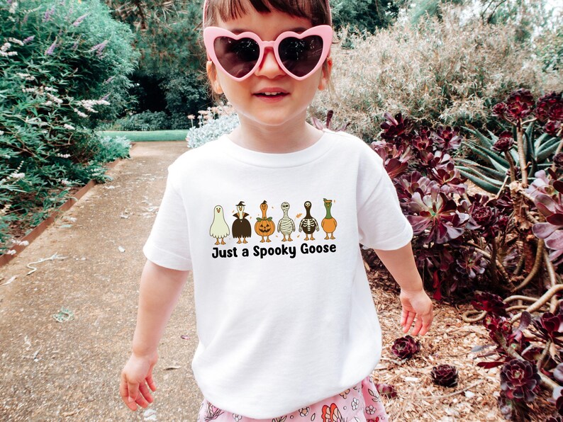 Halloween Spooky Goose Girl shirt, Funny Goose Tshirt, Fall Toddler Sweatshirt, Cute Fall Baby Shower, Cute Goose Baby Onesie®, Ghost Pumpkin Toddler Gift, Boo Halloween Shirt, Spooky Season Tshirt, Retro Halloween Tee, Vintage Halloween, Trick or Treat, Autumn Spooky Vibes, Just a Spooky Goose Funny Toddler T-Shirt