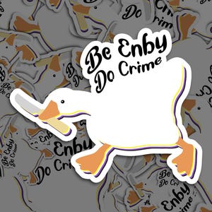 May include: A white goose sticker with a knife in its beak. The goose is walking with its legs outstretched. The sticker has a purple, yellow, and white border and the text "Be Enby Do Crime" in black.