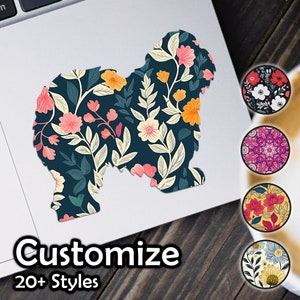 Puede incluir: Una pegatina floral con forma de perro con un fondo azul marino, con flores y hojas rosas, naranjas y crema. La imagen también muestra cuatro diseños redondos y las palabras "Customize" y "20+ Styles".