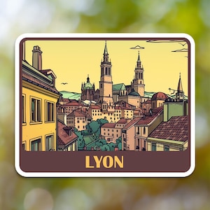 May include: A vintage postcard illustration of the city of Lyon, France. The postcard features a yellow background with a cityscape of buildings and a church with two tall towers. The text "LYON" is printed in brown at the bottom of the postcard.
