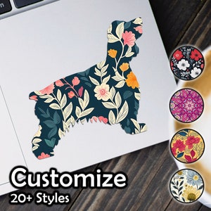 May include: A silhouette of a cocker spaniel dog with a floral pattern in shades of pink, yellow, and green on a dark blue background. The image includes the text "Customize" and "20+ Styles".