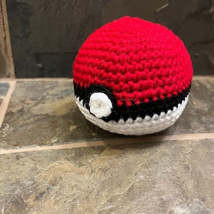 Pokeball dog toy top