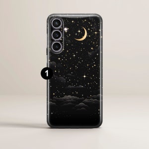 May include: A black phone case with a starry night design. The case features a crescent moon and gold stars on a black background with clouds.