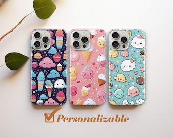 May include: Three phone cases with a cute cartoon ice cream and dessert theme. The cases are pink, blue, and black with white accents. The text "Personalizable" is printed below the cases.