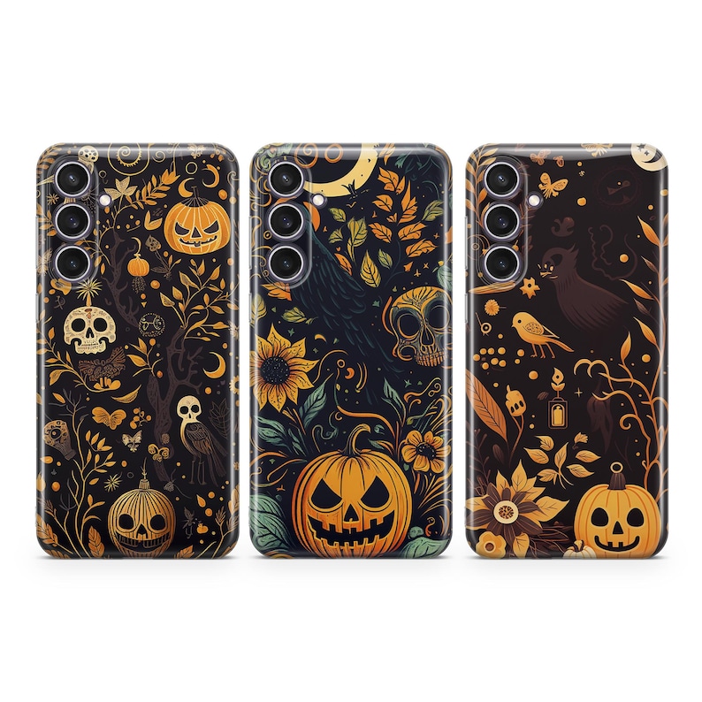 May include: Three black phone cases with a Halloween theme. Each case features a different design with pumpkins, skulls, and other spooky elements. The cases are all black with a matte finish.