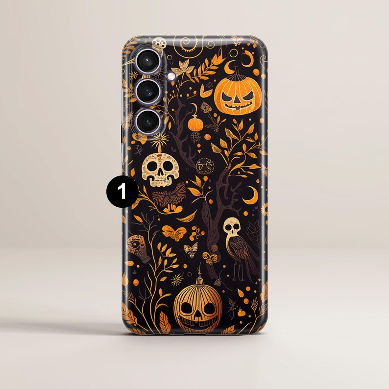 May include: Black phone case with a Halloween-themed design featuring skulls, pumpkins, and owls. The design is in a dark, vintage style with gold accents.
