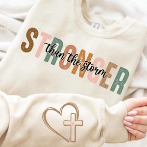 Stronger Than The Storm Sweatshirt, Christian Hoodie, Faith-Based Inspirational Apparel, Christian Style Crewneck, Strong Women Sweatshirt