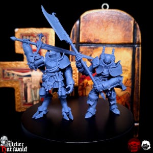 May include: Two blue miniature knight figurines, each holding a weapon. One figure holds a sword and a spear, while the other wields a large axe. The figures are on a black base, with a blurred background.