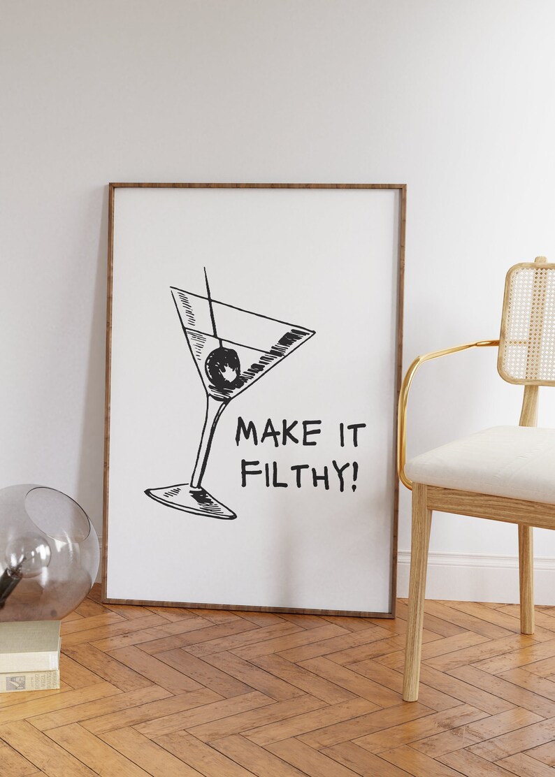 Printable wall art. Black and white. Fine line drawing of a martini with the text MAKE IT FILTHY! beside it. Multiple sizes available in description. Instant download.