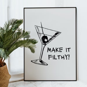 May include: Black and white illustration of a martini glass with an olive, and the text "MAKE IT FILTHY!" on a white background.