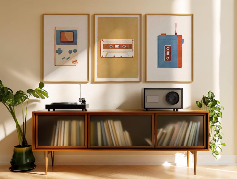 a room with a record player, a radio, a plant and pictures on the