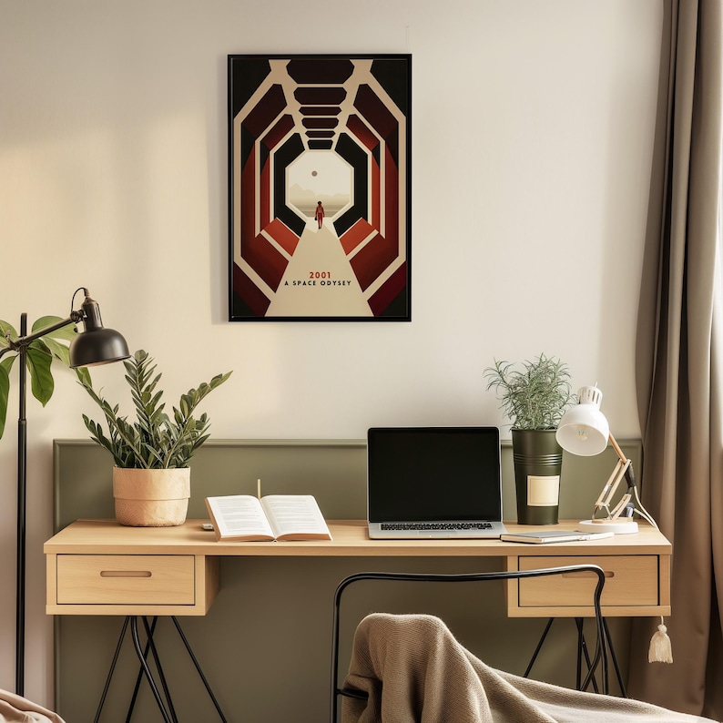 a laptop computer sitting on top of a wooden desk