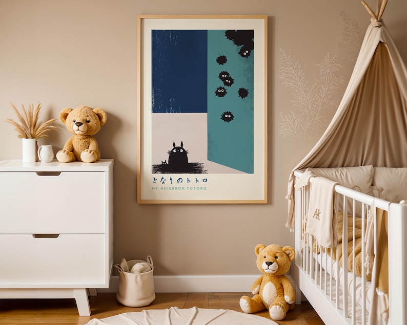 A nursery room with a crib, a dresser, and a framed poster on the wall. The poster features a cat and the text "My Neighbor Totoro".