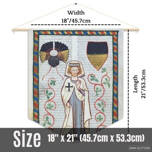 May include: A tapestry wall hanging featuring a medieval illustration of a person in a white robe with a cross on their chest. The illustration is surrounded by a decorative border with red, blue, and gold accents. The tapestry is 18 inches wide and 21 inches long.