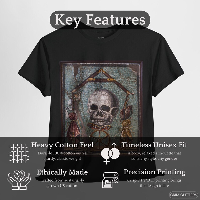 May include: Black t-shirt with a vintage-style image of a skull and crossbones. The image is surrounded by a decorative frame. The t-shirt features a heavy cotton feel, a timeless unisex fit, and precision printing.