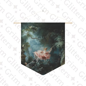 May include: A wall hanging featuring a Rococo painting of a woman on a swing in a lush, green forest. The artwork depicts a woman in a pink dress, with a hat, swinging in a forest setting. The wall hanging is rectangular with a wooden dowel at the top.