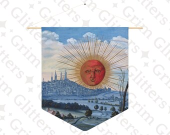 May include: A vintage-style tapestry featuring a stylized sun with a human face over a cityscape. The sun is red with gold rays and the city is painted in shades of blue and gray. The tapestry is framed by a wooden rod and hangs against a white background.