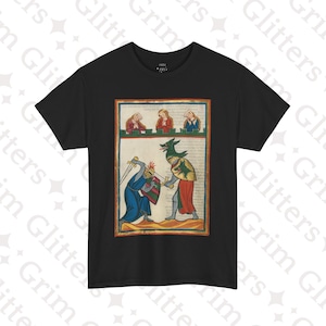May include: Black t-shirt with a medieval illustration of a knight fighting a dragon. The illustration is framed in a gold border and features three people watching the fight from a balcony.