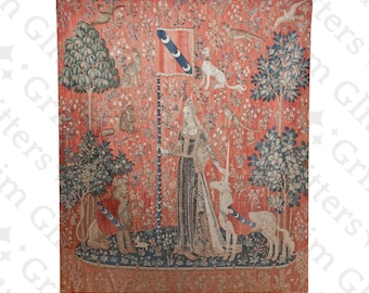 May include: A tapestry depicting a woman in a long, flowing gown holding a unicorn by the reins. The woman is standing in a garden with a variety of flowers and trees. The tapestry is framed in a dark wood frame.