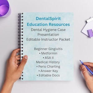 May include: A spiral-bound notebook with the text "DentalSpirit Education Resources" and related topics like "Dental Hygiene Case Presentation" and "Beginner Gingivitis." The notebook is held by a person, with a pen and other items in the background.