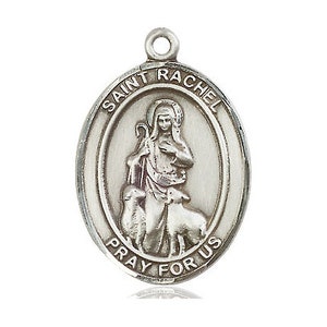 Op de afbeelding: Zilveren ovale medaille met een afbeelding van Sint Rachel die een lam vasthoudt. De medaille heeft de woorden "Sint Rachel Bid voor ons" rond de rand.