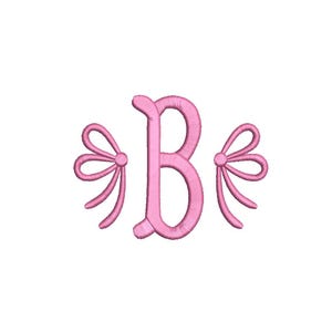 May include: Pink embroidered monogram letter "B" with decorative bow accents on each side. The design is set against a clean white background, perfect for personalized items.