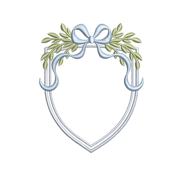May include: A decorative shield-shaped design with a light blue bow and ribbons, and green leaves. The frame is outlined in a light gray color. The design is suitable for embroidery or crafting projects.