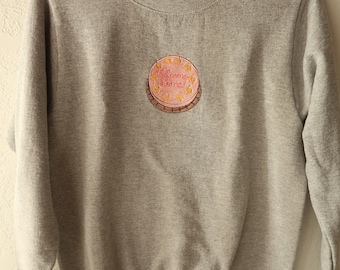 Embroidered Welcome Home Cake Crewneck.